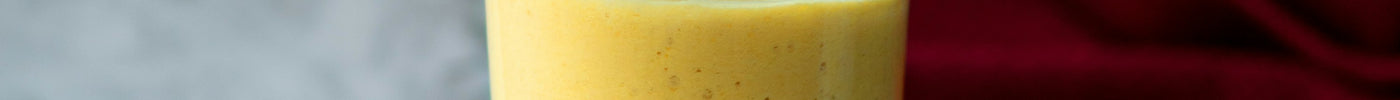 Tropical mango baobab smoothie in a glass