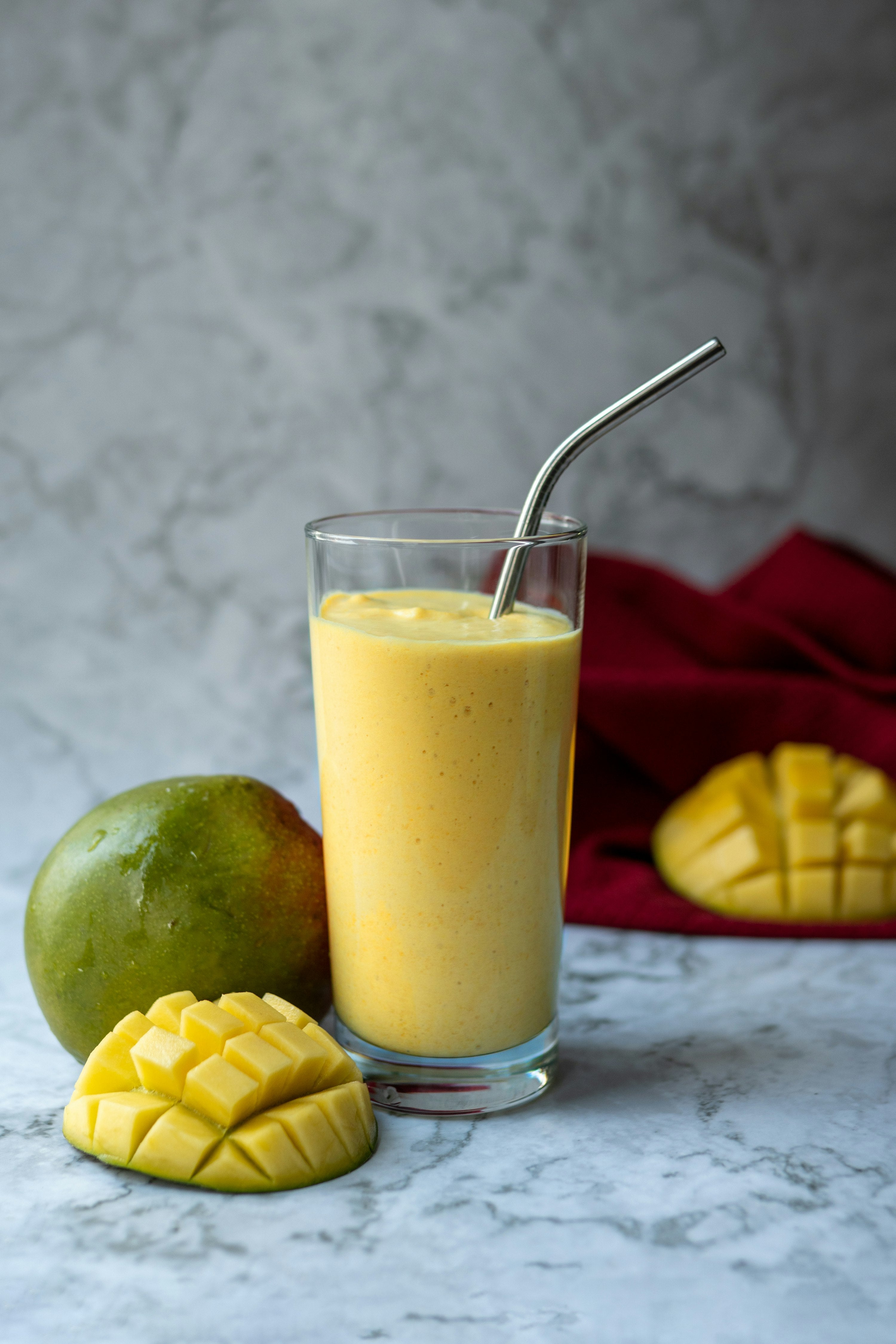 Tropical mango baobab smoothie in a glass